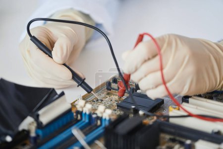 Photo for Macro shot of female engineer working with electronic parts in laboratory, copy space - Royalty Free Image