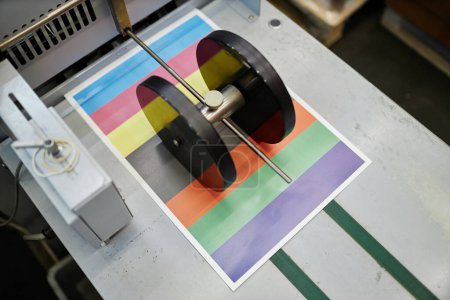 Photo for Top view of industrial printing machine with color test sheet, copy space - Royalty Free Image