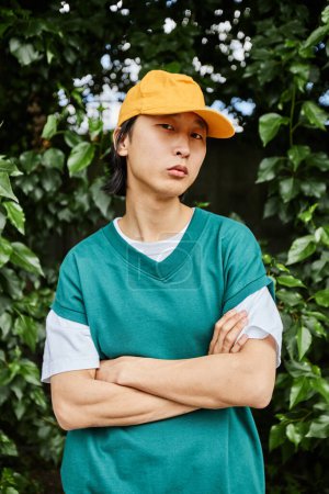 Photo for Portrait of young Asian man wearing colorful casual wear posing outdoors and looking at camera - Royalty Free Image