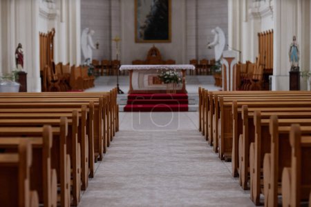 Photo for Horizontal image of empty old church with altar and wooden seats for different ceremonies - Royalty Free Image