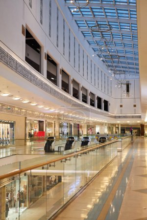 Photo for Vertical background image of empty shopping mall interior with glass ceiling copy space - Royalty Free Image
