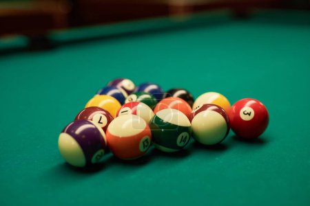 Photo for Close up background image of billiard balls on green table in pool club copy space - Royalty Free Image