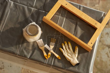 Photo for Top view background of DIY furniture restoration materials on table, copy space - Royalty Free Image