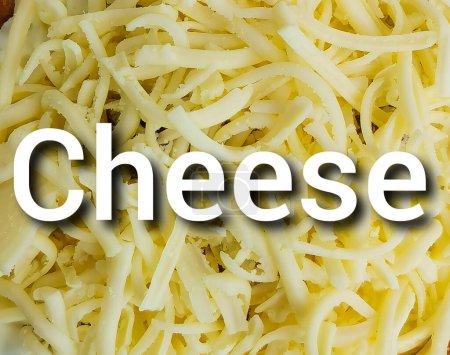 The inscription cheese on the background of grated cheese