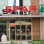 Spar trademark at the entrance to the shopping center in Budapest