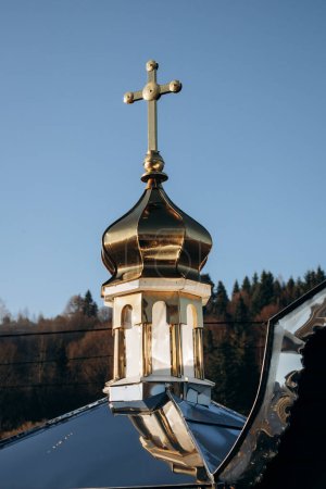 Photo for Golden domes of Christian church in the village - Royalty Free Image