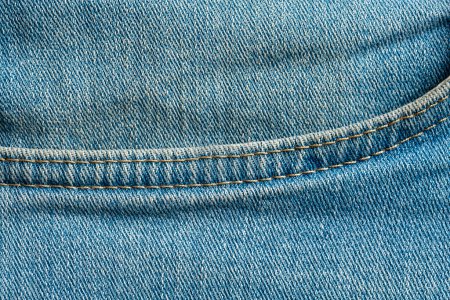 Photo for Blue jeans fabric with pocket background or denim texture. Close up view - Royalty Free Image