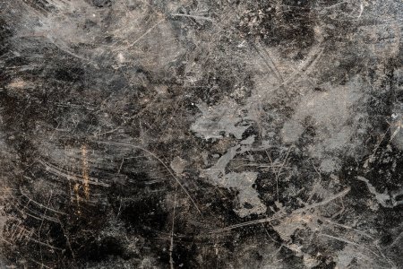Foto de Grunge viejo fondo de metal negro o textura con arañazos y grietas, de cerca, vista superior - Imagen libre de derechos
