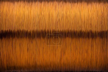 Foto de Metal texture of a coil of copper wire, close-up. Coil of thin copper wire on the background - Imagen libre de derechos