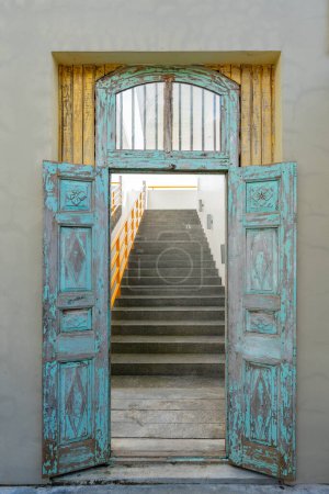 Photo for Old vintage open wooden door and steps in tropical island Koh Phangan, Thailand. Close up - Royalty Free Image