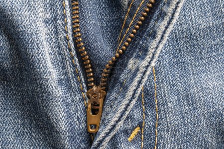 Photo for Blue jeans open zipper on background, close up. Zipper on denim pants blue color - Royalty Free Image