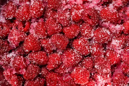Photo for Fresh red raspberry berry, covered with granulated sugar for jam preparation in bowl, top view, close up. Background and texture of raspberries with sugar - Royalty Free Image