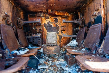 Photo for Inside view of burnt-out military infantry fighting vehicle. Burning military vehicles on exhibition of destroyed military equipment of the russian occupiers in Kyiv, Ukraine. Burnt military machinery - Royalty Free Image