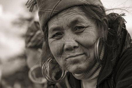 Photo for Sapa, Vietnam - march 06, 2020 : Portrait hmong ethnic woman on the street market in mountain village Sapa, North Vietnam - Royalty Free Image