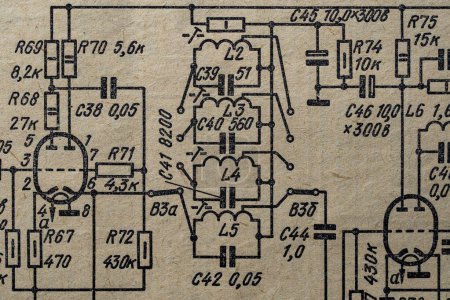 Photo for Old radio circuit printed on vintage paper electricity diagram as background for education, electricity industries and repair. Electric radio scheme from USSR, close up - Royalty Free Image