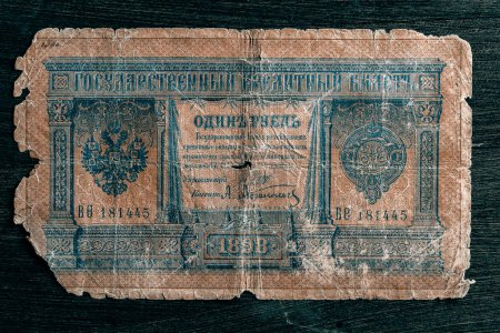Photo for Very old worn and torn Tsar ruble bill from the late 19th century. Vintage imperial russian ruble banknote from Tsarist Russia, close up - Royalty Free Image