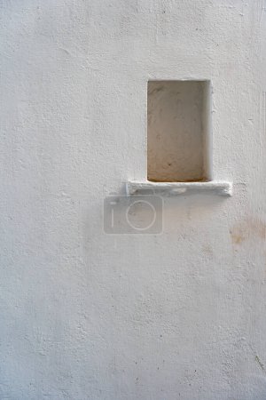 Foto de Fondo de pared blanca con un nicho en la ciudad Udaipur, Rajastán, India. Cerrar, copiar espacio - Imagen libre de derechos