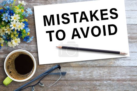 Photo for MISTAKES TO AVOID,Text on notebook in office desk workplace background. Business strategy, Business and financial concept. Office desk table concept. - Royalty Free Image