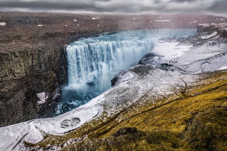 Beautiful waterfall in Iceland in winter. Dettifoss waterfall. Icelandic landscape. Travel and tourism theme
