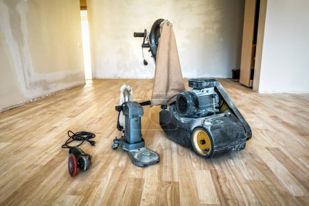 Photo for Set of professional sanding cleaning polishing machines for parquet floor. Industrial theme - Royalty Free Image
