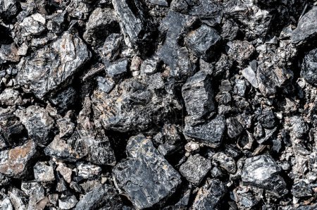 Natural black coals background. Industrial coals as a texture