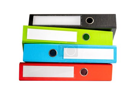 Foto de File Folder Binder stack of multi color on table in business office isolated on white background with clipping path. - Imagen libre de derechos