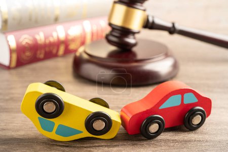 Photo for Hammer gavel judge with car vehicle accident, insurance coverage claim lawsuit court case. - Royalty Free Image