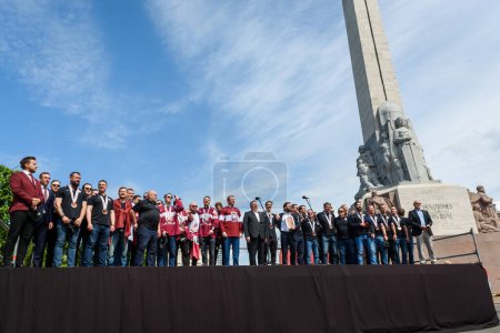 Photo for RIGA, LATVIA. 29th May 2023. IIHF Worlds Bronze Medalists Latvian Men's Ice Hockey team arrival massive celebration at Monument of Freedom. - Royalty Free Image