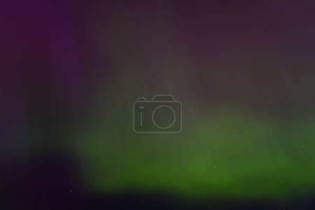 CARNIKAVA, LATVIA. 10th May 2024. Selective focus photo. Impressive northern lights, aurora borealis in the sky. The most impressive Northern lights in 20 years.