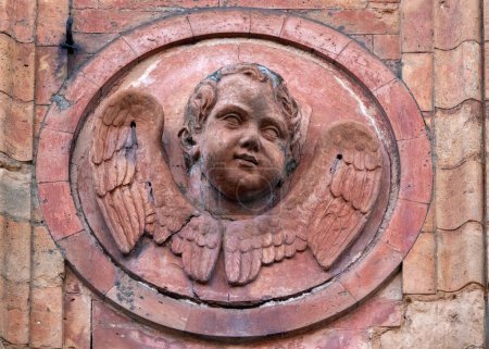 Photo for Angel on the facade of the former church of Sant'Apollonia, Ferrara, Italy - Royalty Free Image