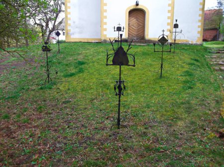 Metal crosses in a cemetery in the village