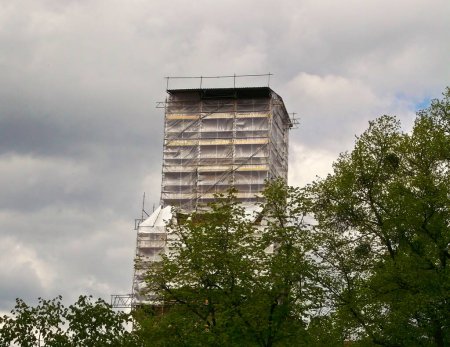 The packed and scaffolded school tower