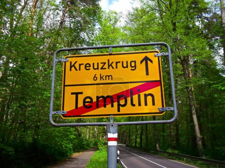 City exit sign with the inscription - Templin - Kreuzkrug 6 km