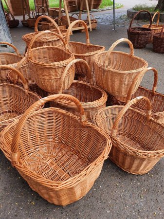 A collection of handmade wicker baskets at an outdoor market
