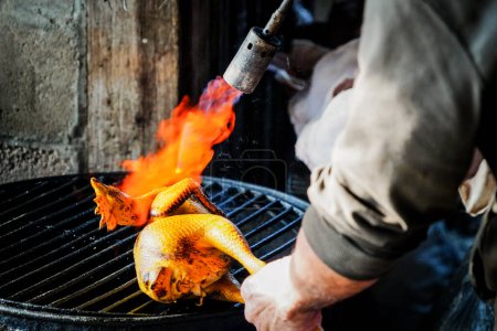the human who burning chicken with dramatic tone