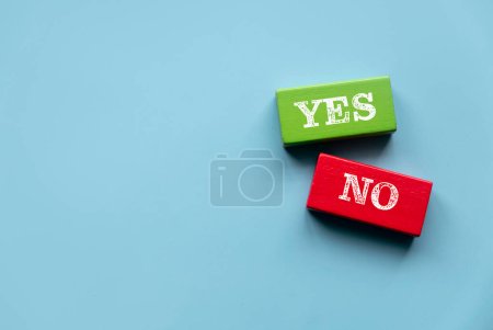 Photo for Consider Yes Or No Decisions When Making Business Decisions in Tough Circumstances. Wooden color with yes and no sign. - Royalty Free Image