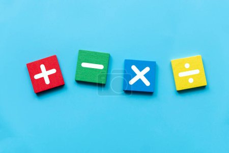 Photo for Concept of education, business, math or calculation. Mathematical operations symbols of plus, minus, multiply, and divide over blue background. - Royalty Free Image