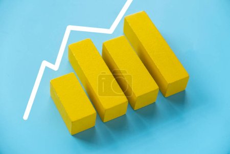 Business charts. Company financial report. Goal for business, bank, finance, investment, money. Quarterly report concept. Yellow bar chart.