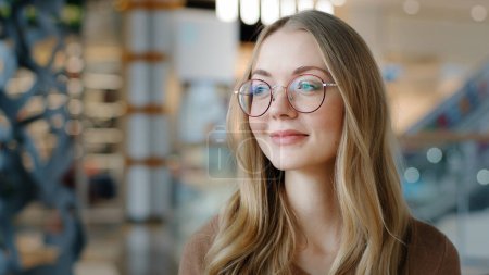Photo for Head shot portrait Caucasian lady female girl in glasses pensive woman looking away ophthalmology services millennial blonde model with healthy eyesight good vision indoors think pondering thinking - Royalty Free Image