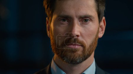 Photo for Business portrait serious Caucasian man adult male posing in evening office looking at camera close-up headshot sad face middle-aged 40s bearded businessman agent boss employee worker standing indoors - Royalty Free Image