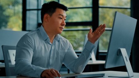 Photo for Chinese middle-aged businessman work on computer receive bad email notification wrong test result disappointed asian man business owner make mistake feel negative emotion professional defeat concept - Royalty Free Image