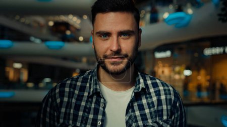 Photo for Joyful happy man bearded 30s guy successful businessman stylish shopper business owner posing in modern shopping center cheerful smiling positive smile close-up caucasian hispanic ethnic male portrait - Royalty Free Image