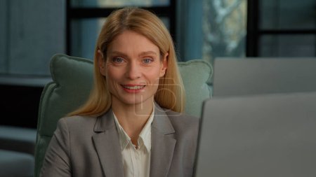 Photo for Caucasian middle-aged adult woman business 30s businesswoman entrepreneur worker employer in company corporate office with computer looking smiling to camera. Female freelancer secretary portrait - Royalty Free Image