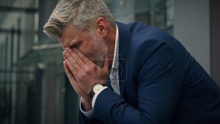 Photo for Caucasian sad upset business man senior mature stressed ill depressed businessman middle-aged gray haired hopeless despair employer in city suffering headache failure problem unemployment grief stress - Royalty Free Image