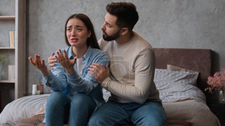 Photo for Caucasian man apologizing husband calming anxious annoyed wife ask forgiveness after family conflict crying tears woman emotional complain listen to spouse apologies quarrel relations crisis breakup - Royalty Free Image