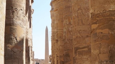 The Temple of Karnak, Luxor, Egypt. Great Hypostyle Hall with Hieroglyphics on Pillar.