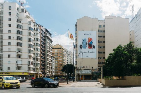 Photo for Rio de Janeiro, Brazil - January 29, 2023: An advertisement billboard for the latest Apple iPhone, the iPhone 14 Pro, is seen on the side of a building in Rio de Janeiro, Brazil - Royalty Free Image