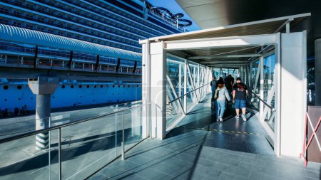Photo for Malaga, Spain - November 22, 2023: Passengers boarding the MSC Seaview cruise ship in Malaga, Spain - Royalty Free Image