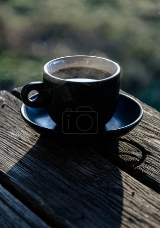 Photo for A cup of morning coffee on the terrace, during the sunrise. For coffee fans, against all odds. - Royalty Free Image