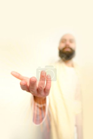 biblical scene, Jesus Christ Hand ask for follow or following as offer or offering, young pensive bearded and mustachioed man, guy with 30 years in image of Savior, concept of Holy Scriptures